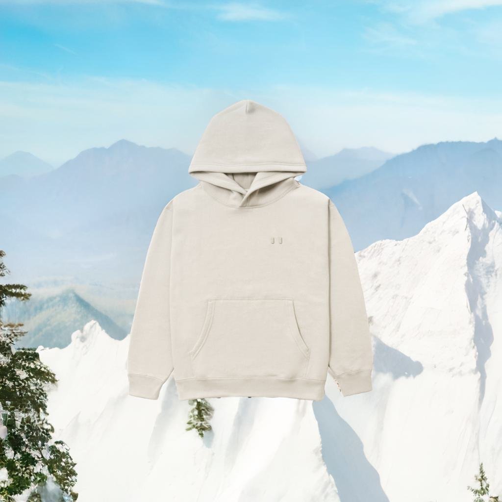 The Flag Fleece Hoodie from Province of Canada, floating in front of Canadian nature 